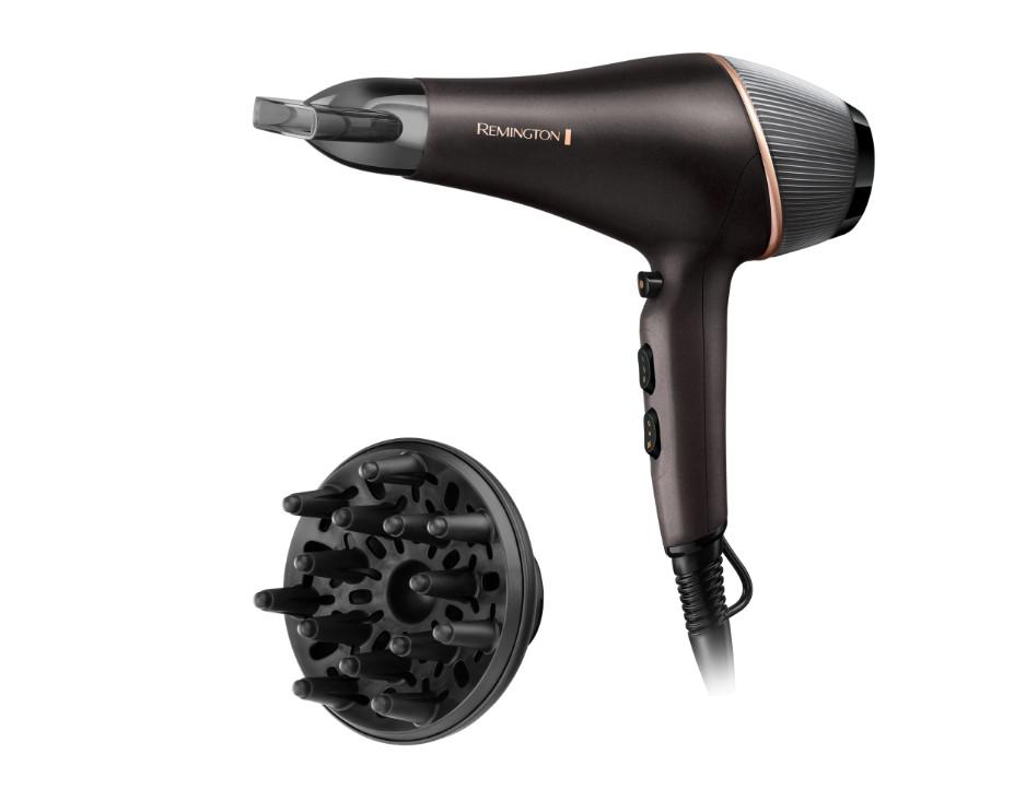 overlay_48aba2501cef5b6f031644c3e7527b98.jpg Uscator de par Remington, Copper Radiance, 2200W, Ionizare, grila ceramica, - imagine 1